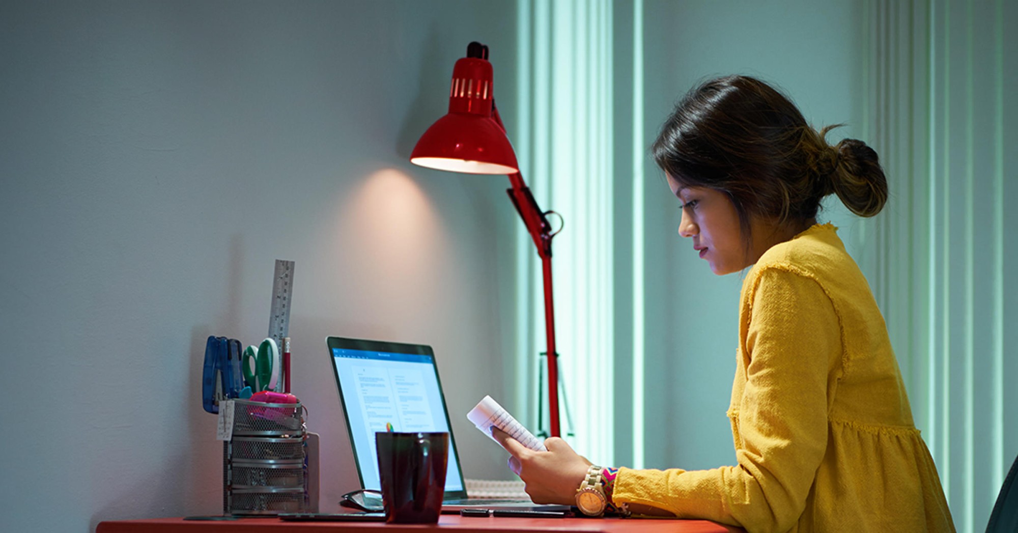 Photo of a woman working at her laptop